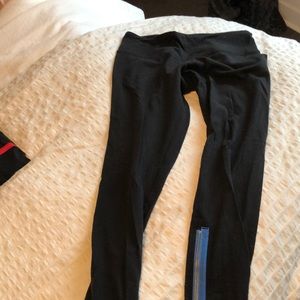 Lululemon black cotton thighs. Gently worn and lovely zipper detail size 6.
